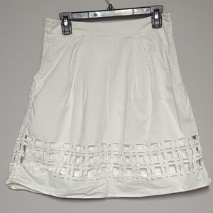 White Knee-Length A-Line Skirt with Pleated Cutout Design
